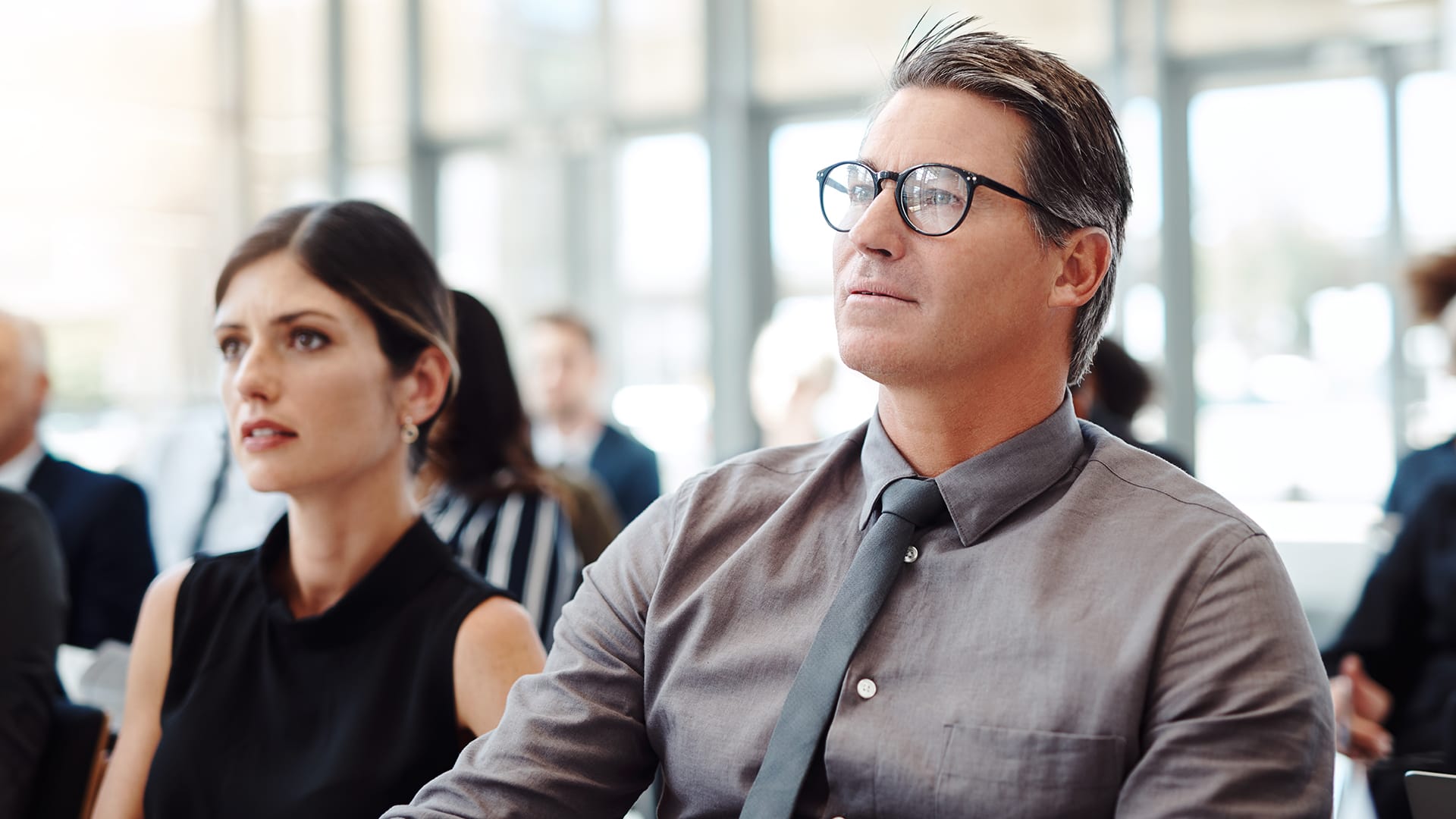 BioNTech employees listen attentively